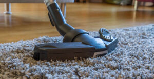 Arcadia House Cleaning Services vacuuming carpet